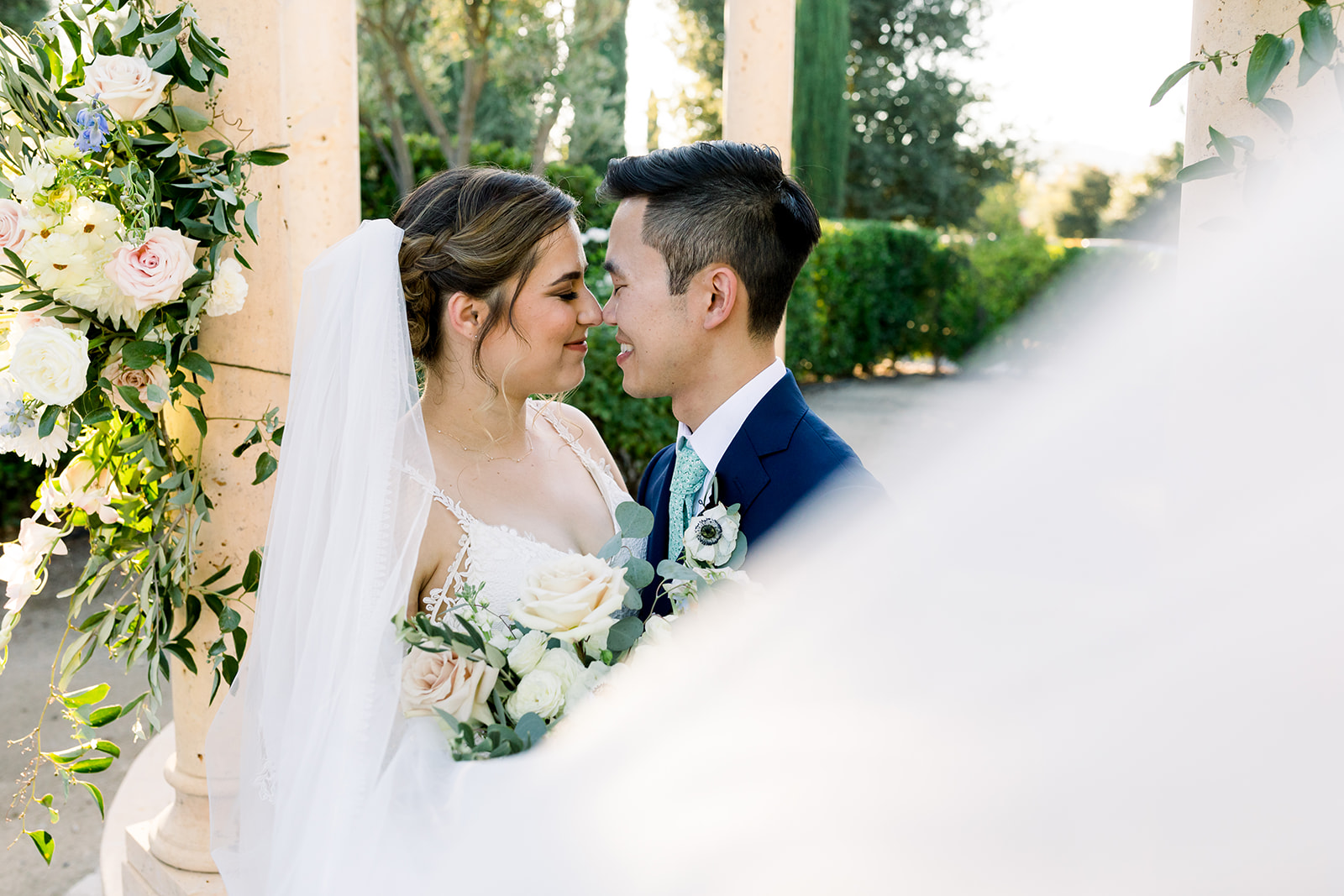 SLO wedding photographer captures bride and groom at the alter at allegretto resort wedding